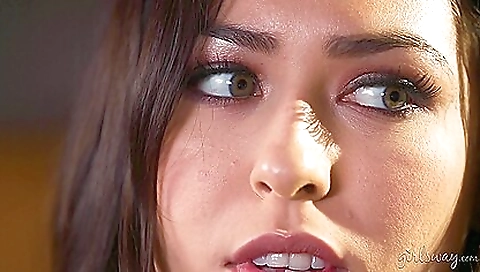 Teeny fucks her pussy with a dildo